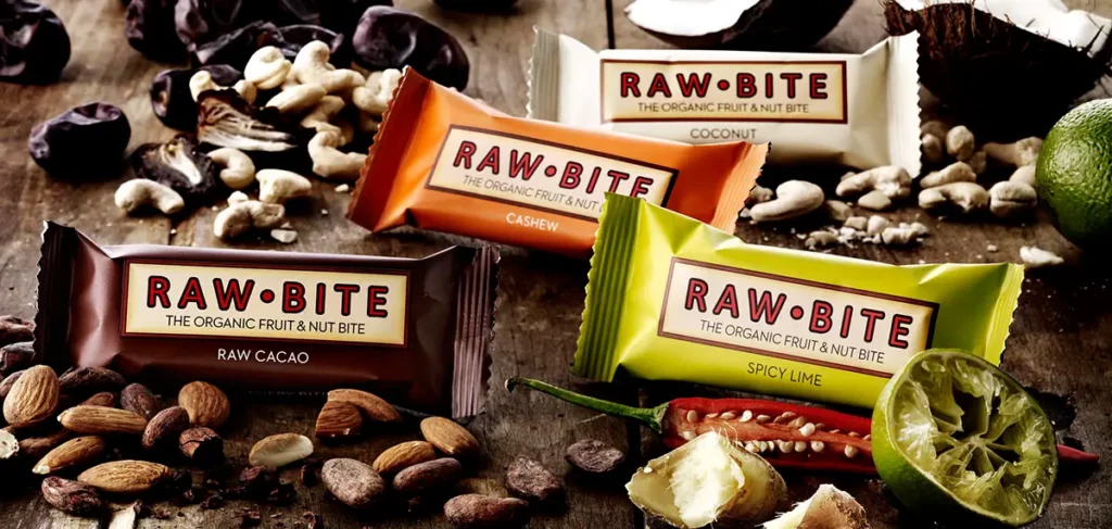 Barres énergétiques naturelles Raw-Bite entourées d'oléagineux et de fruits frais pour les 20 km de Bruxelles.