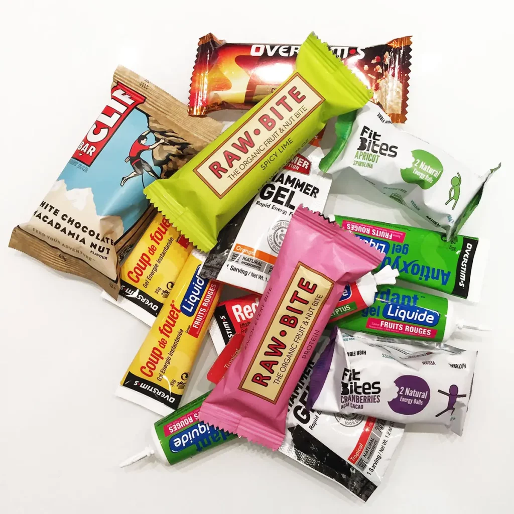 Sélection de produits de nutrition sportive pour les 20 km de Bruxelles avec barres Clif, Raw-Bite et gels énergétiques.